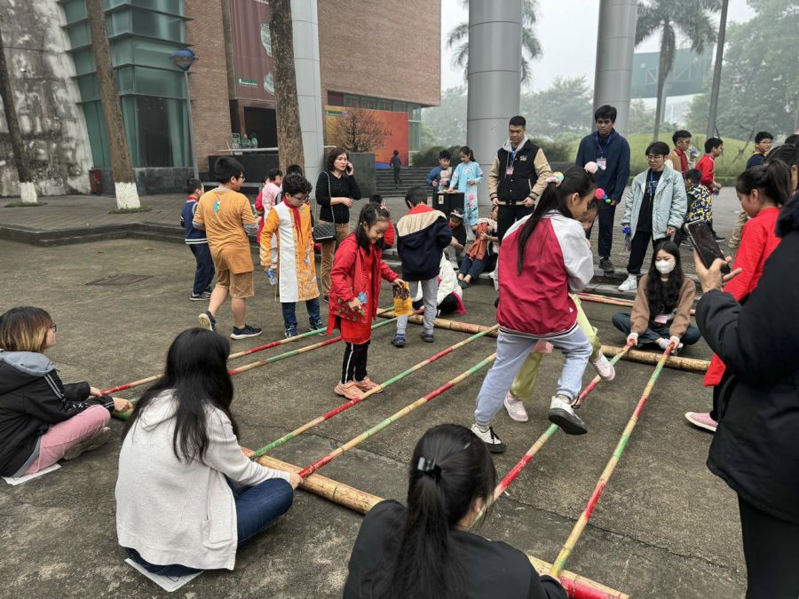 Dancing on bamboo poles