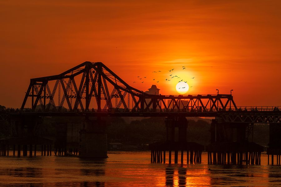 sunset in Long Bien Bridge in Hanoi