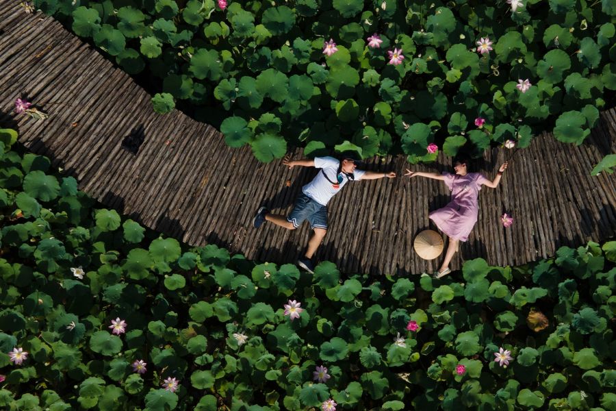 Lotus Pond And Bamboo Bridge in Mua Cave
