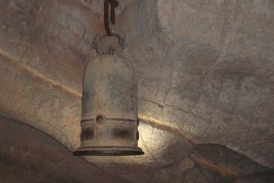 an old bell in Dark Cave - Bich Dong Pagoda