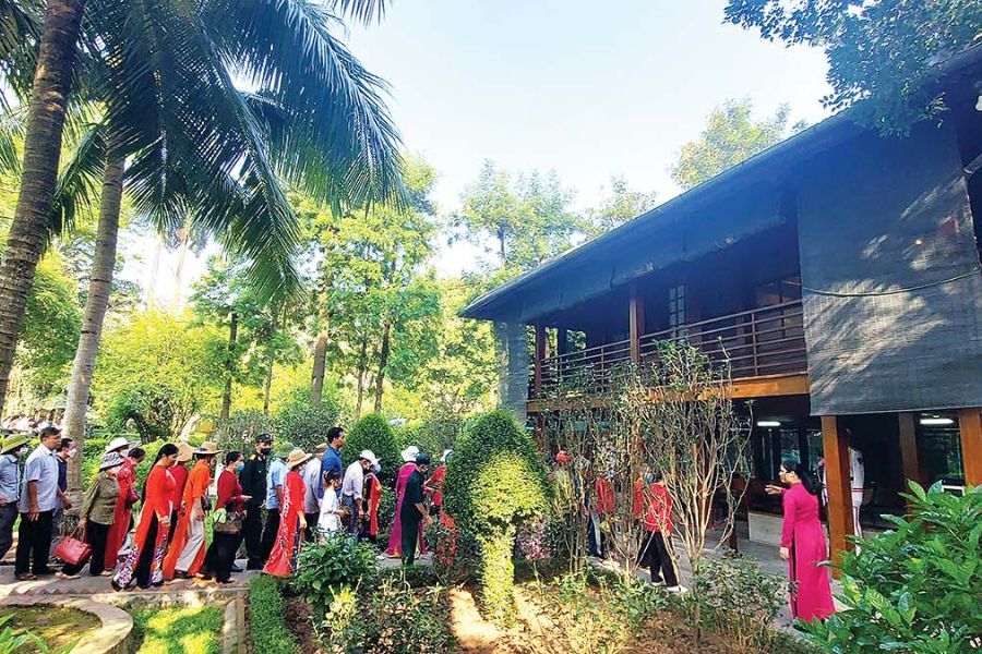 people visit Chi Minh Stilt House furniture