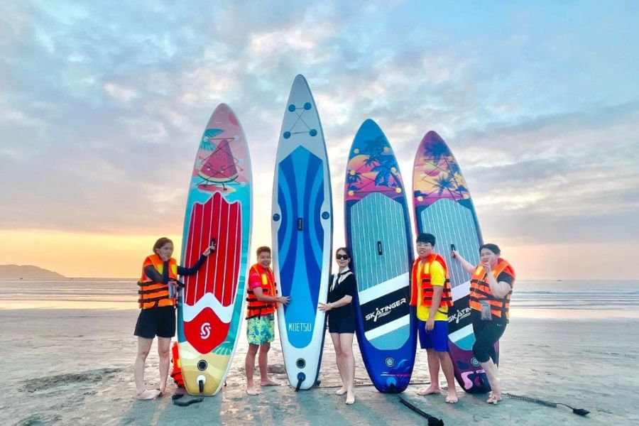 stand-up paddleboarding at man thai beach
