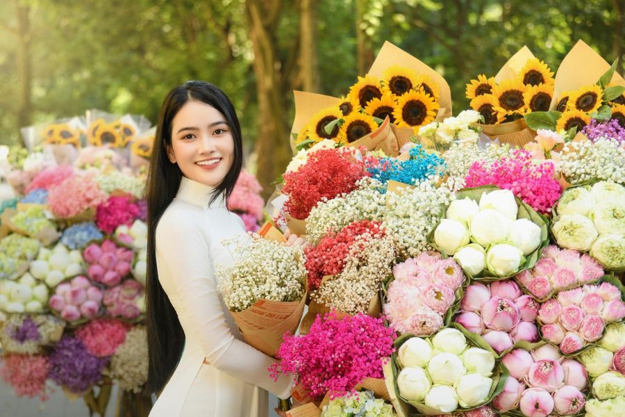 taking photo with lotus in Phan dinh phung street in Hanoi