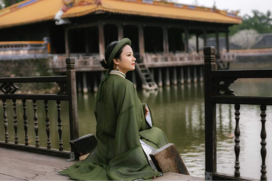 taking photos with traditional costume in Tu Duc Comp