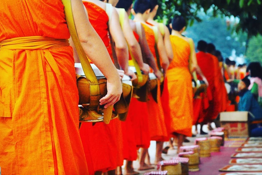 tourists take part in the ceremony