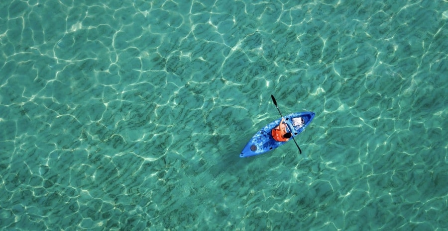 Kayaking along Koh Rong Samloem's coastline