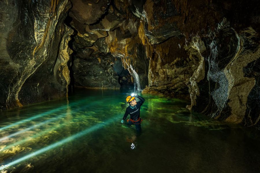 Swimming And Wading Through Underground Rivers