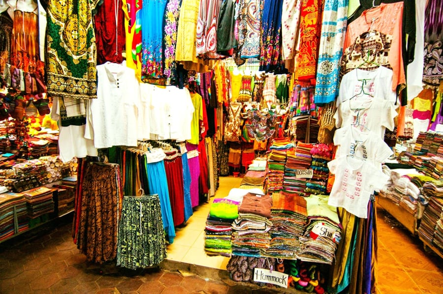 traditional Khmer clothing, scarves, and more modern designs in the market