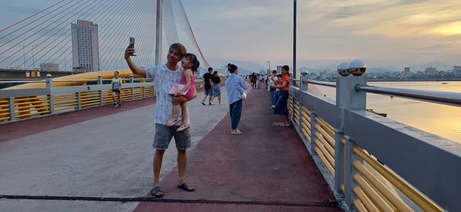 Enjoy A Scenic Walk Across Nguyen Van Troi Bridge