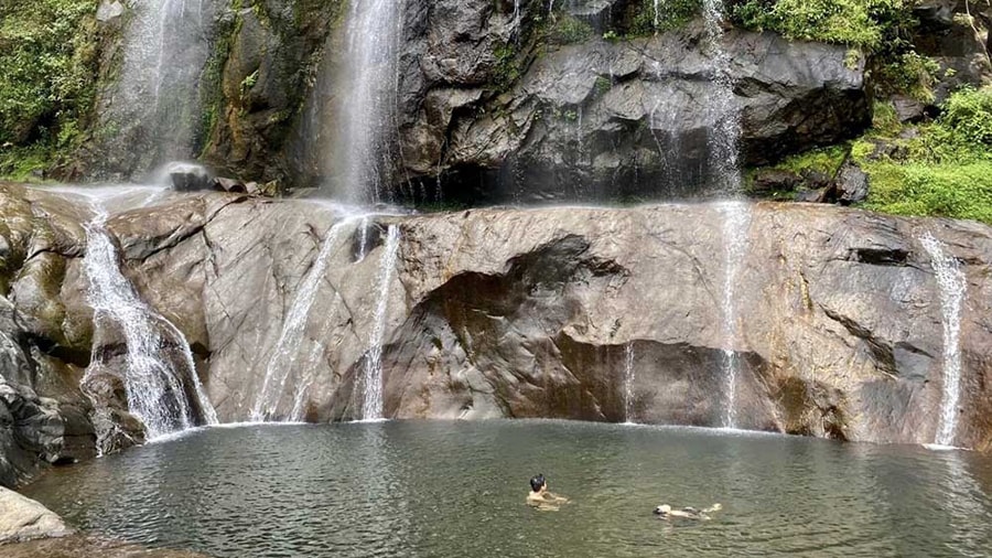 swimming in Tac Tinh Waterfall