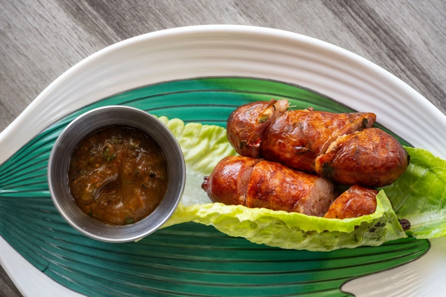 Enjoying Lao Sausage In Lao